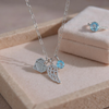 Baby Blue Topaz Charm