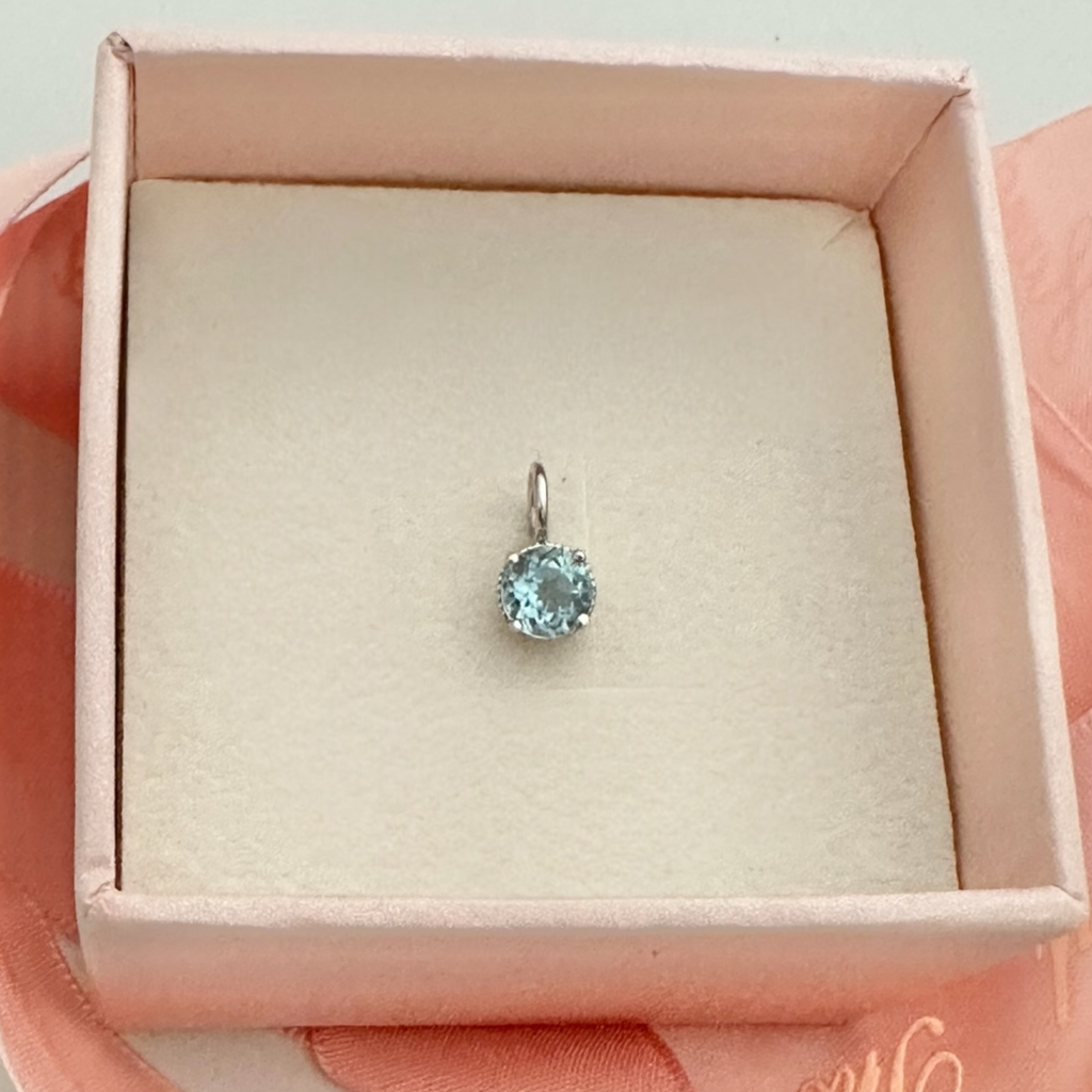 Baby Blue Topaz Charm