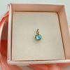 Baby Blue Topaz Charm