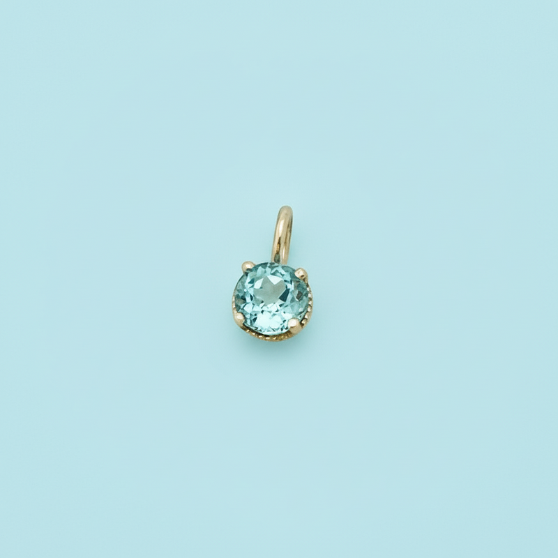 Baby Blue Topaz Charm