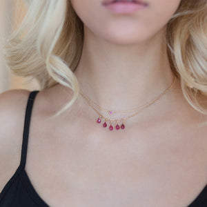 SHOP THE LOOK  Baby pink sapphire bezel necklace layered with pink sapphire briolets. Each sold separately