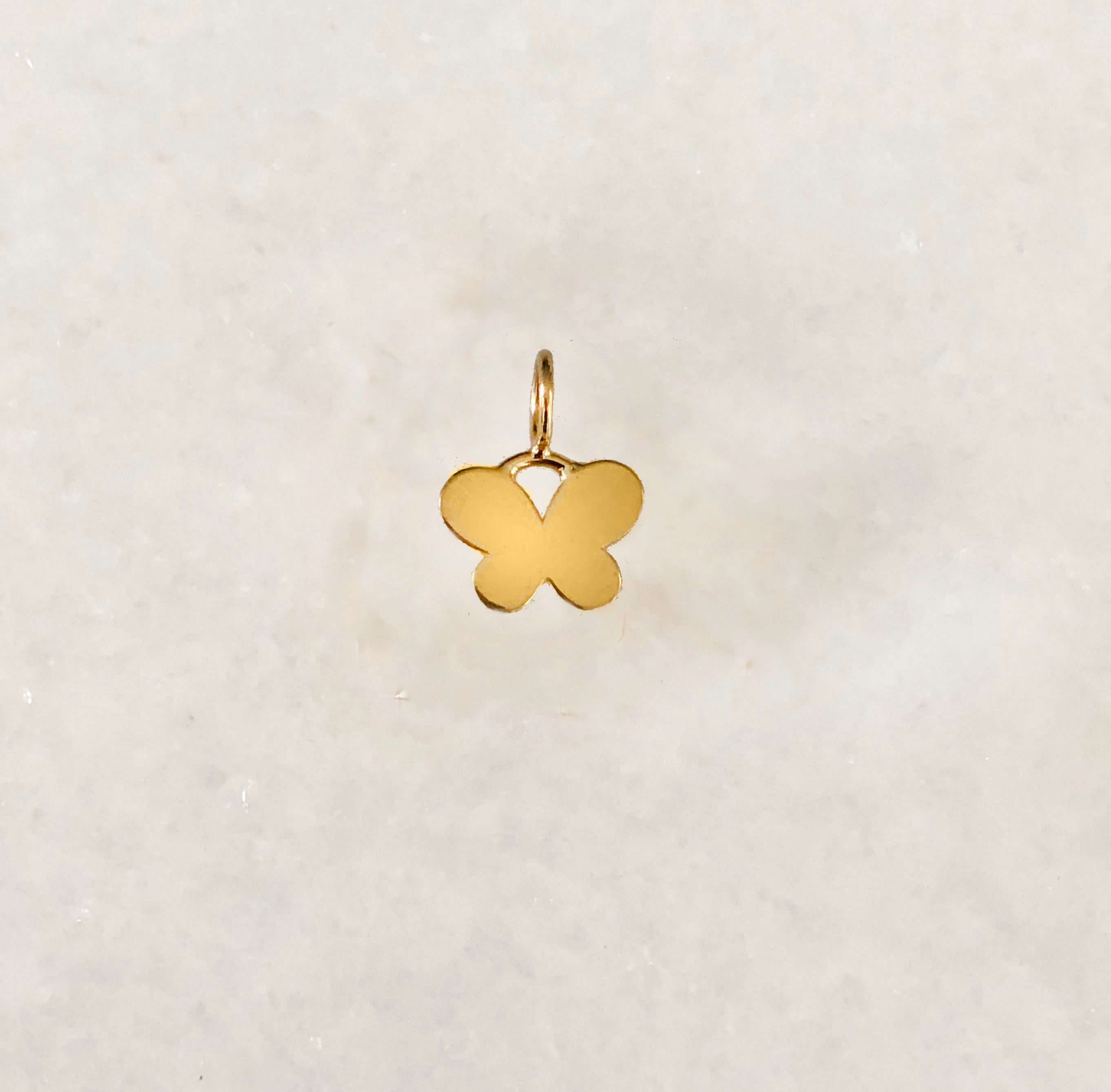 Gold butterfly charm hotsell
